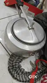 1 new cooker - 3 ltrs 
1 old cooker- 5 ltrs