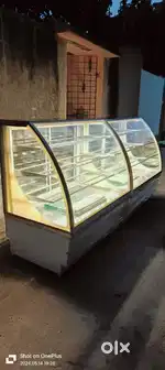Sweet shop cake pastry display counter showcase 9 month old running