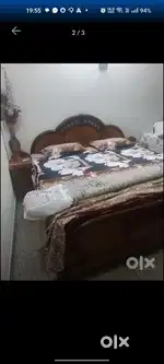Double bed with side cabinets