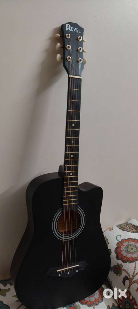 Revel guitar with bag pack and pics