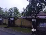 Land with small tiled house for sale