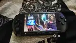 Sony PSP game console with 8GB e1004 model with charger and 7 games