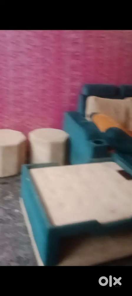 Sofa cum bed 6 sitter with 2puffy and one teapoy table full set