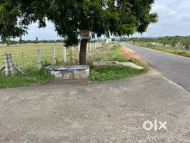 Double sided tar road base 1acre land sale