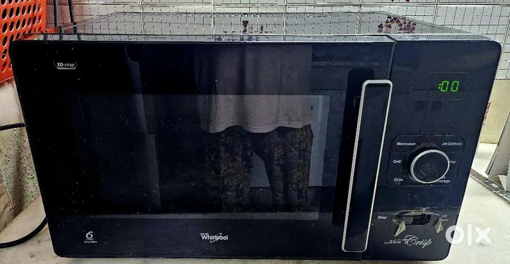 Whirlpool Microwave oven Jet Crisp 25 Litre GT 288 Black less used