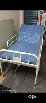 Hospital bed with air bed and mattress
