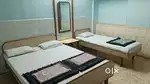 Double bed with mattress and two pillows