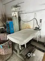 Pressing table with steel boiler