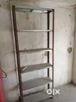 Slotted iron racks 1500₹/piece and an iron stand for hoardings 500₹