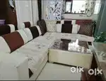 L shape sofa with centre table in a very good condition