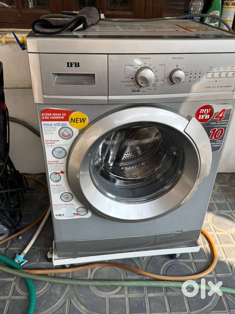 Rarely used Front load fully automatic washing machine for sell