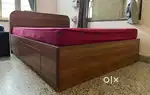 Queen sized bed with storage. Along with 2 matress