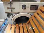 washing machine front load  samsung 9 year old slight repair needed