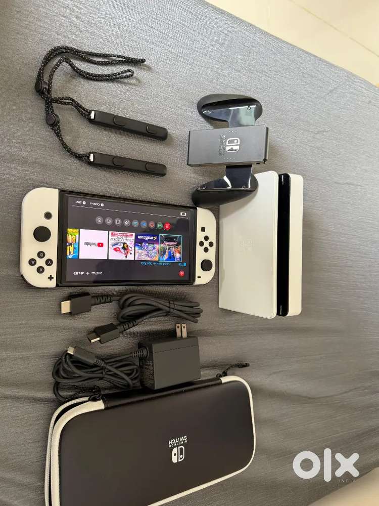 NINTENDO SWITCH OLED WHITE IN BRAND NEW CONDITION