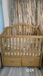 A top quality custom-made teakwood baby cot of 4 feet height & length