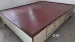 An Unused Doubled Bed English Cot
