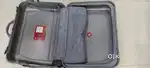 VIP suitcase with wheels and trolley