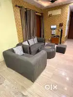 Sofa set , center table with 2 seats.