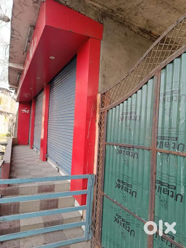 Land with shops at 90 Feet road pandtch Srinagar
