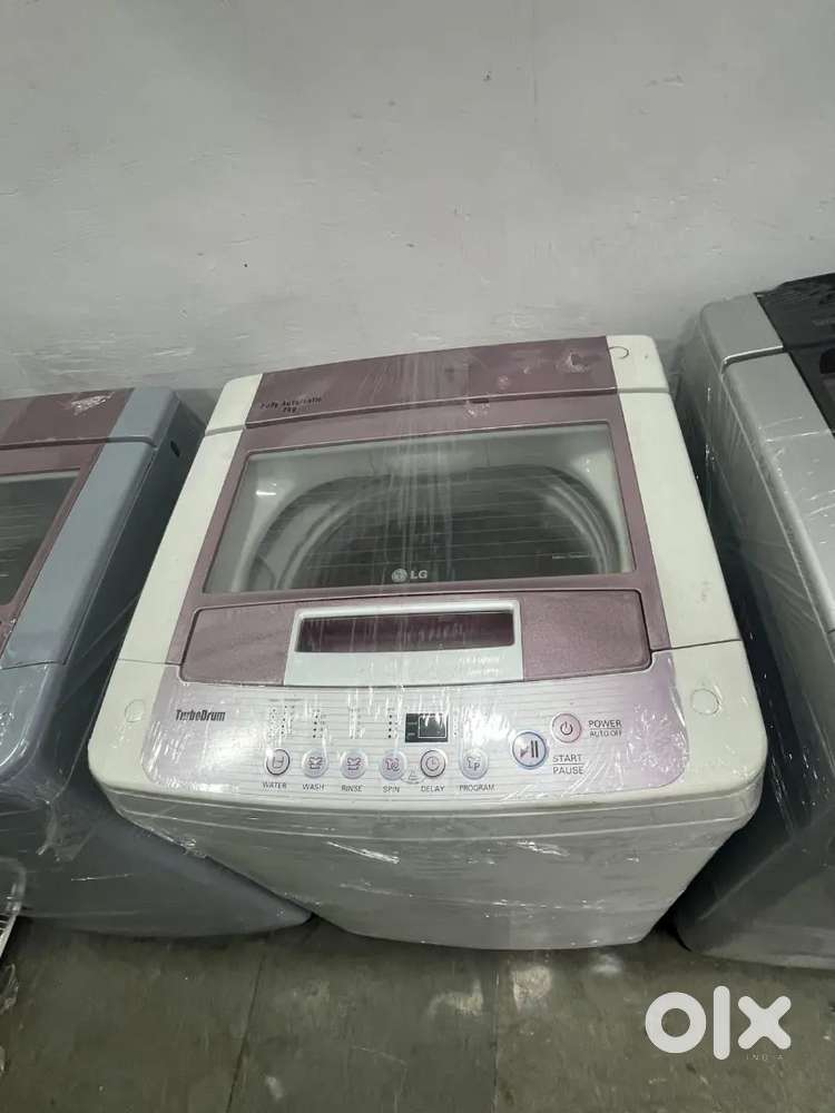 LG washing machine fully automatic top load with warranty good conditi