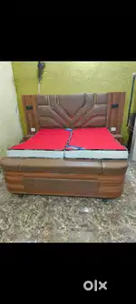 Brand new double bed with matters with side table with lighting