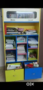 Study table with computer and book shelf