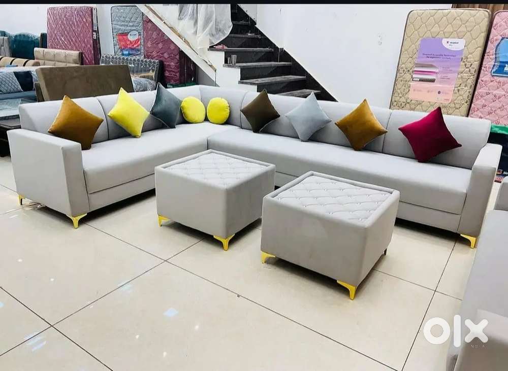 L shape sofa set with pillows available in starf premium furniture