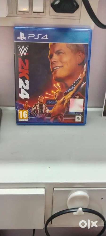 PS4 slim 1tb+WWE 2k24 game cd in new condition