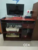 Desktop with computer table and 24 inch TV