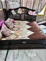 Double sided bed with inbuilt cushioning