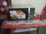 Panasonic microwave oven 4 month age 2 time use