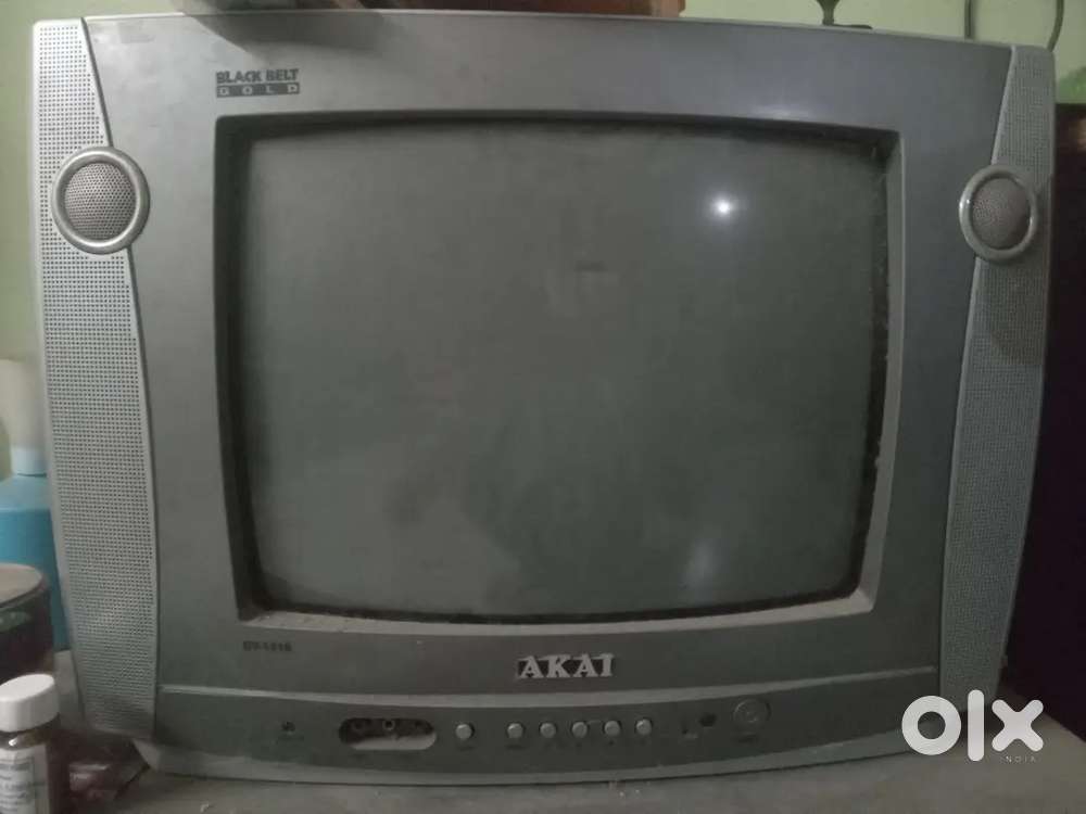 An old small box tv of AKAI company