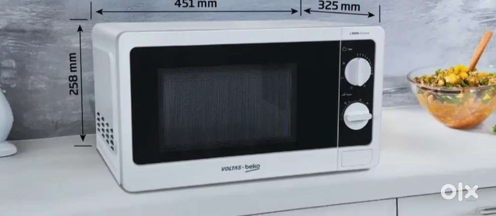 Microwave voltas new conduction 2 month old