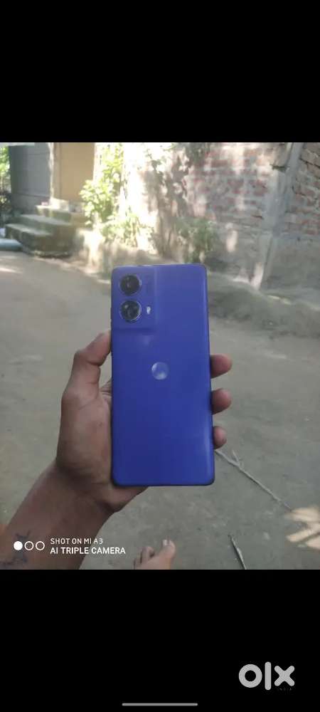 Moto g 85 5 g 1 years old price only 12 k urgent money no problem