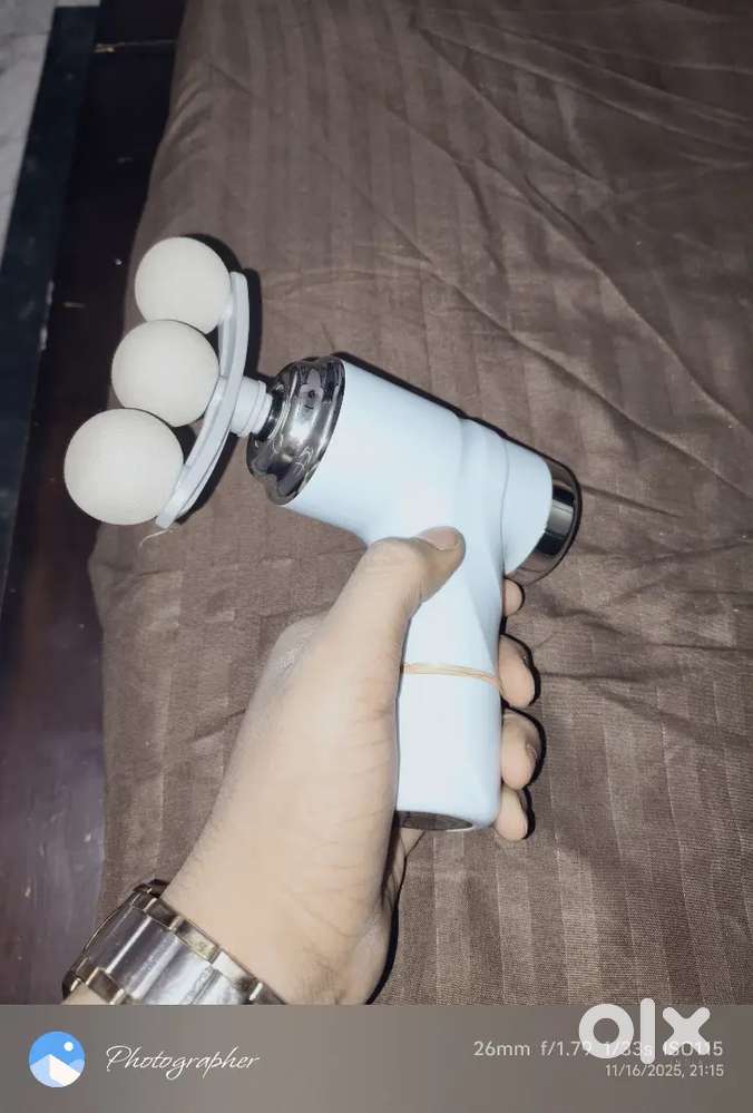 Massager blue colour with a white charger