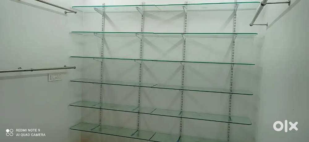 Glass self for saloon and cloth store