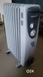 Oil based room heater