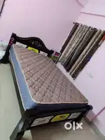 A 6*4 feet  Cot with bed