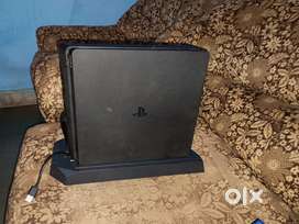 Ps4 slim good condition with 2 controller stand 5 cd best condition