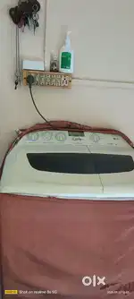 LG semi automatic 7kg intellowash bahut badiya bina kisi kharabi ke ok
