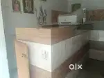 Shop glass table with computer using table