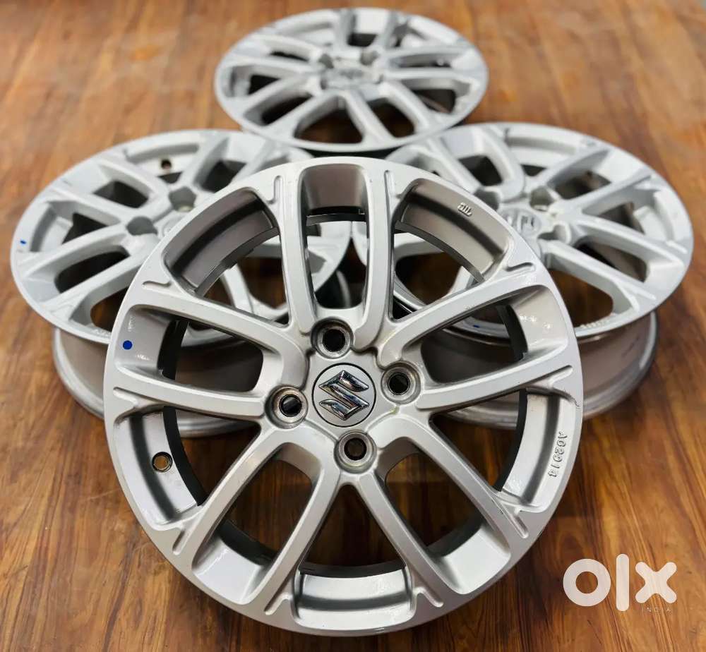 15inch oem Maruti swift silver color Lite used set 4 alloys