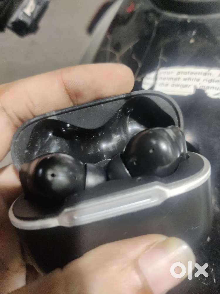 Air buds with cable and box