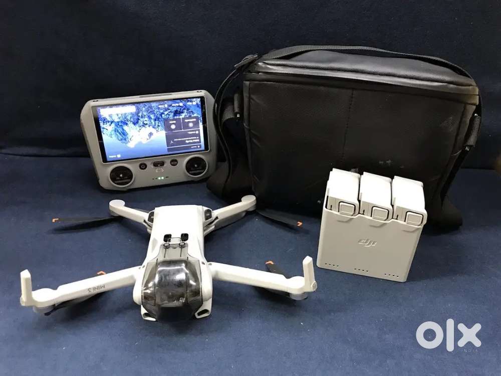 DJI Mini 3 Camera Drone With RC Remote 3 Batteries & Case
