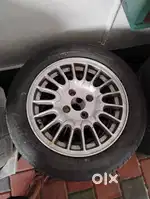15 inch alloys and tyres 100 pcd 4 holes.