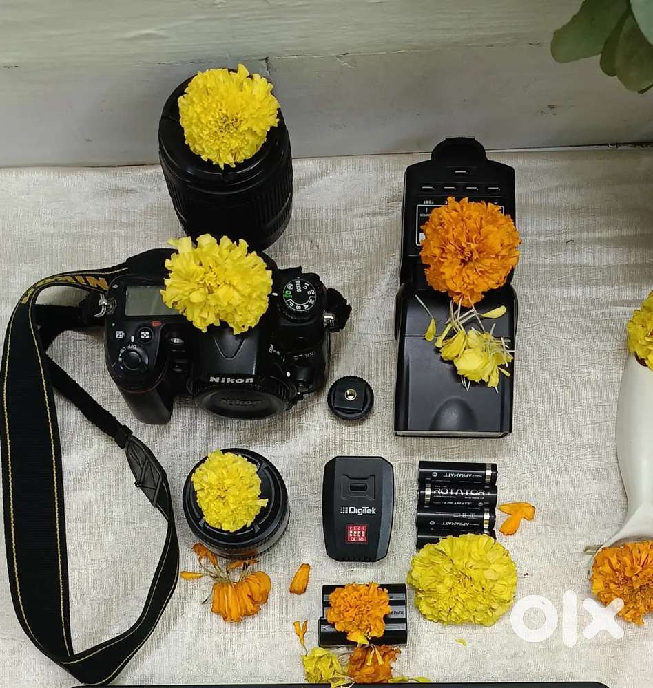 Nikon D7000 DSLR Kit 18-105mm + 50mm Lens + Flash + Bag – 30,000