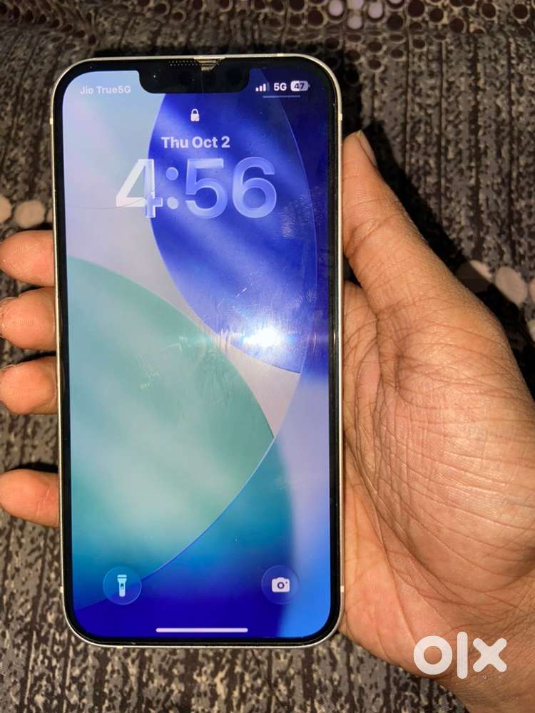 IPhone 13 Scracthless and mint condtion And tempered which is broken