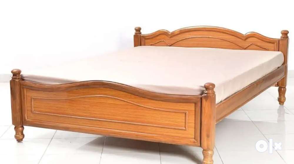 WOODEN DOUBLE-SIZED BED ON SALE.