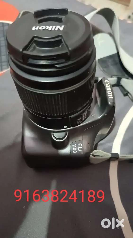 Canon EOS 1100d DSLR camera and 18-55 mm zoom lens