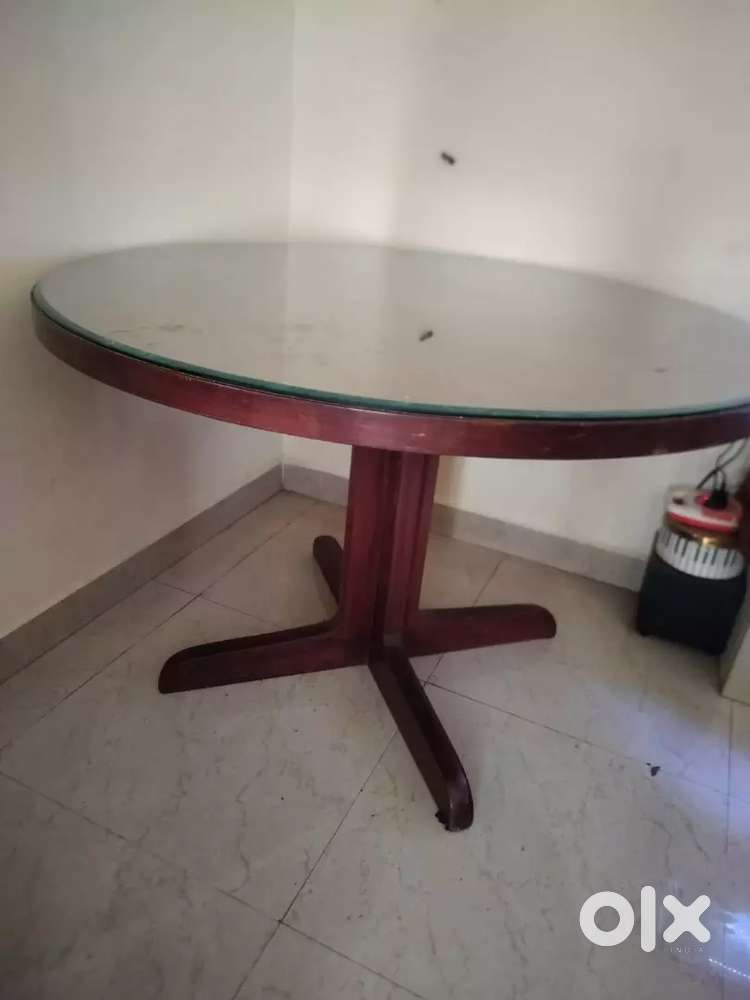 Round glass top table
